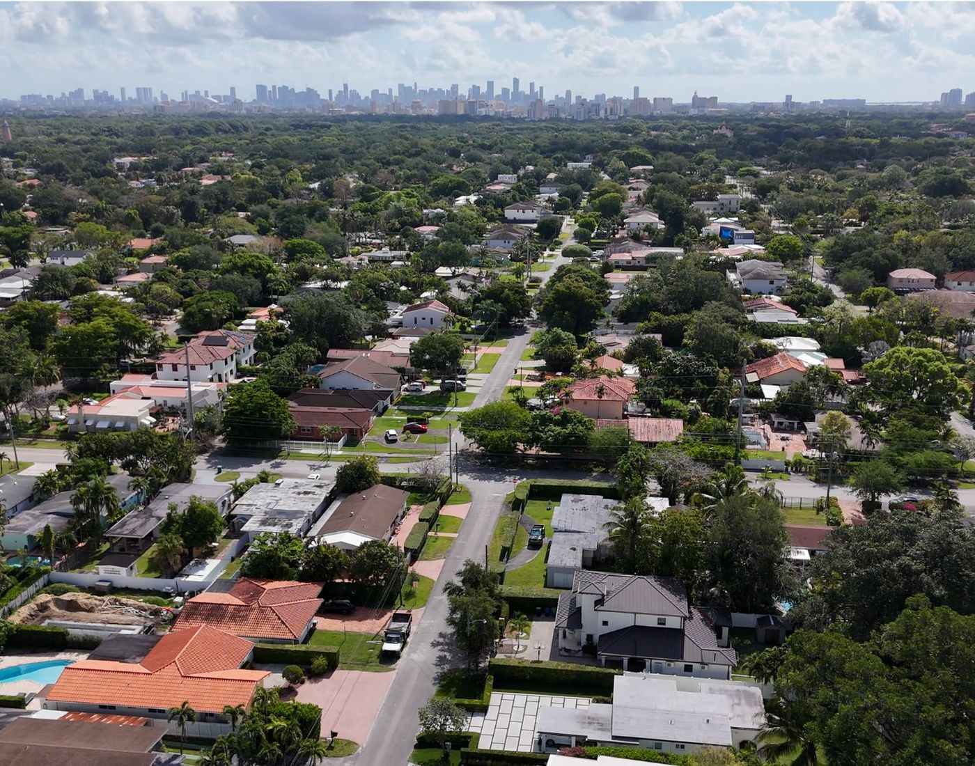 Aerial view of the Schenley Park neighborhood in Miami FL 33155, with the Miami skyline on the horizon