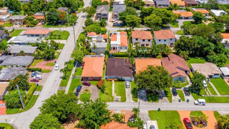 Aerial view of tile and shingle roofs in Schenley Park, Miami FL 33155